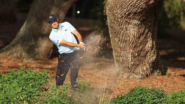 Jordan Spieth plays his third shot on the 14th hole during the second round of the 2024 Players Championship on the Stadium Course at TPC Sawgrass in Ponte Vedra Beach, Fla.
